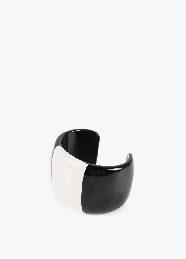 Black and white rigid bracelet