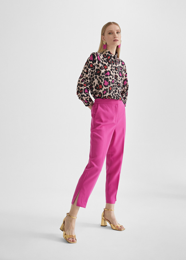 Cropped trousers with slits